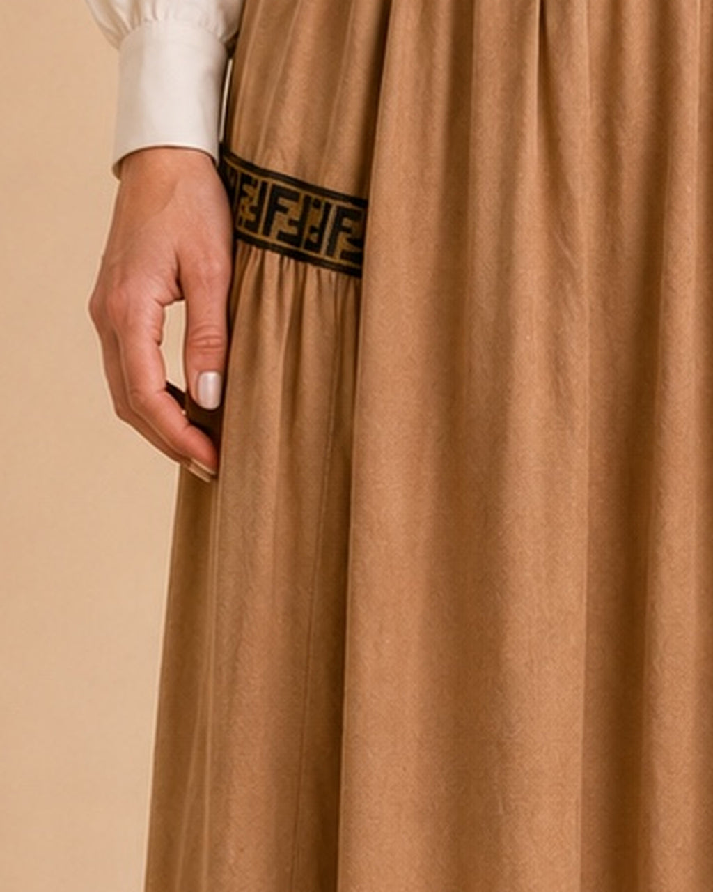 Camel maxi skirt upper geometric trim detail