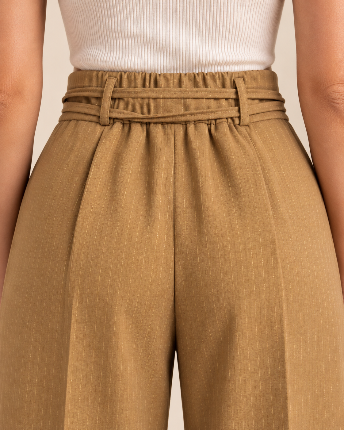 Camel pinstripe trousers waistband and belt loop detail