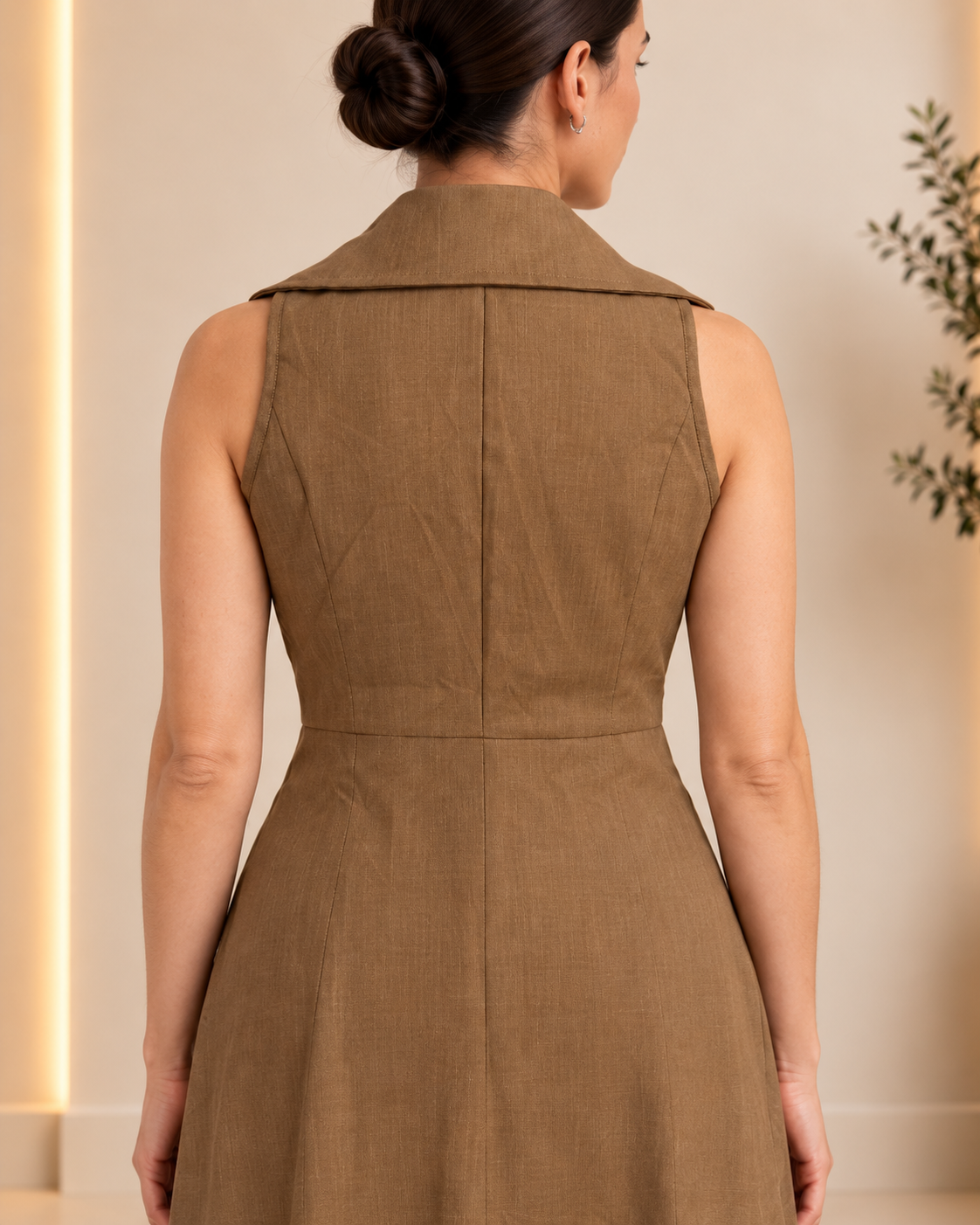 Camel tailored long vest back seams and panel construction detail
