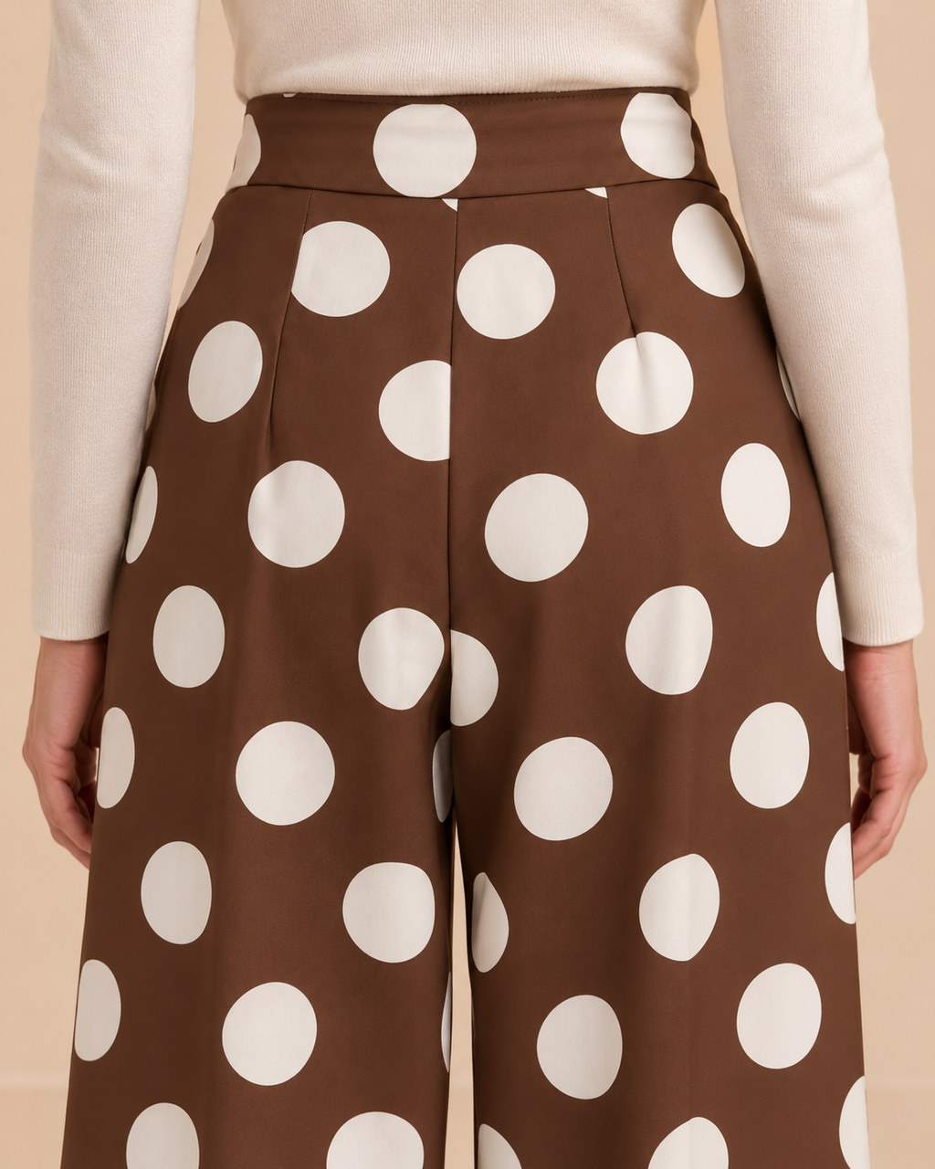 Brown polka dot trousers back waistband and seam detail