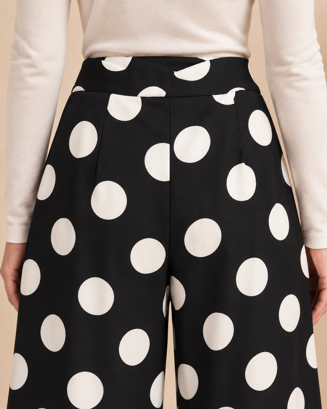 Polka dot pants overlapping waistband detail