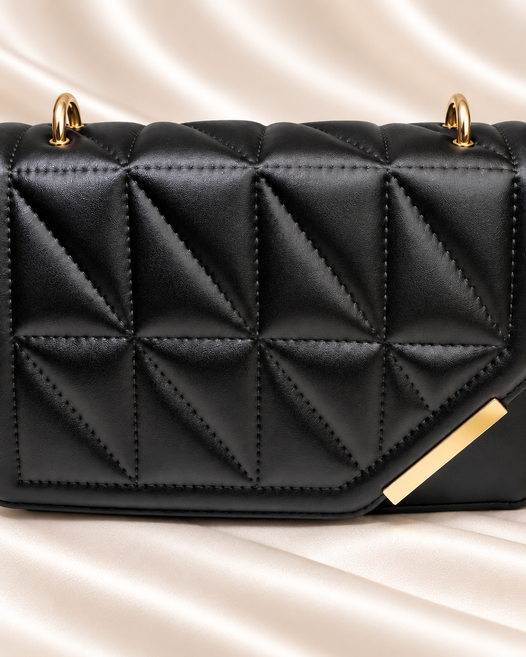 Black geometric quilted bag front quilting detail
