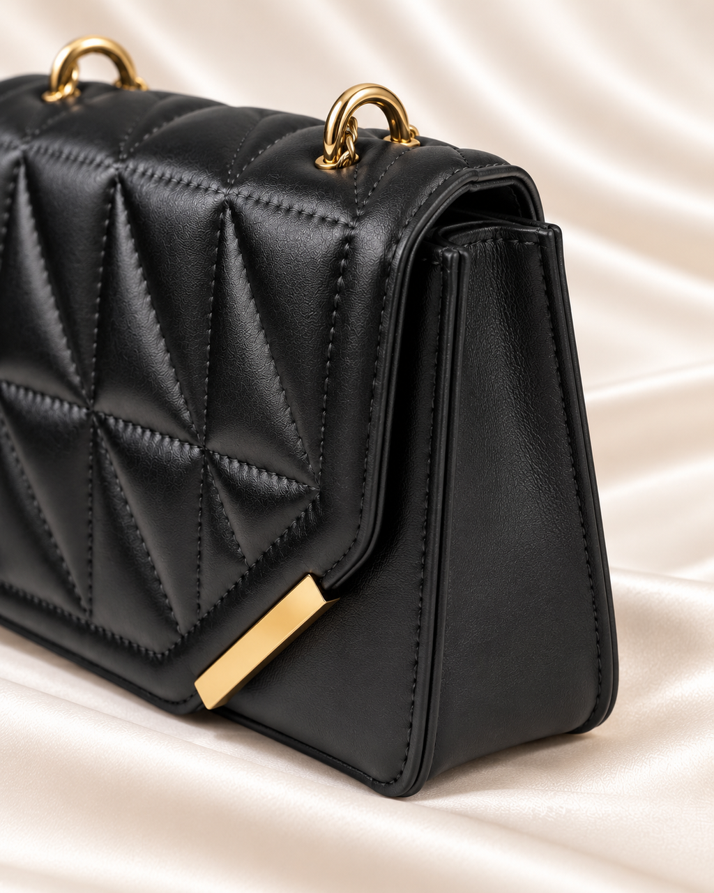 Black quilted bag side gusset detail
