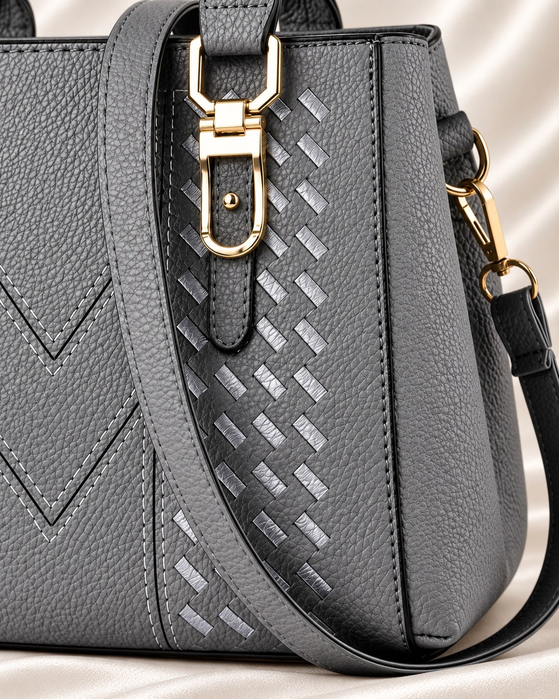Gray handbag woven front panel detail