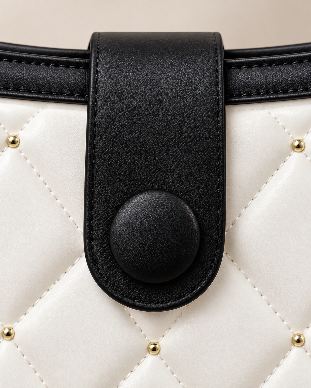 Black closure tab and covered button detail