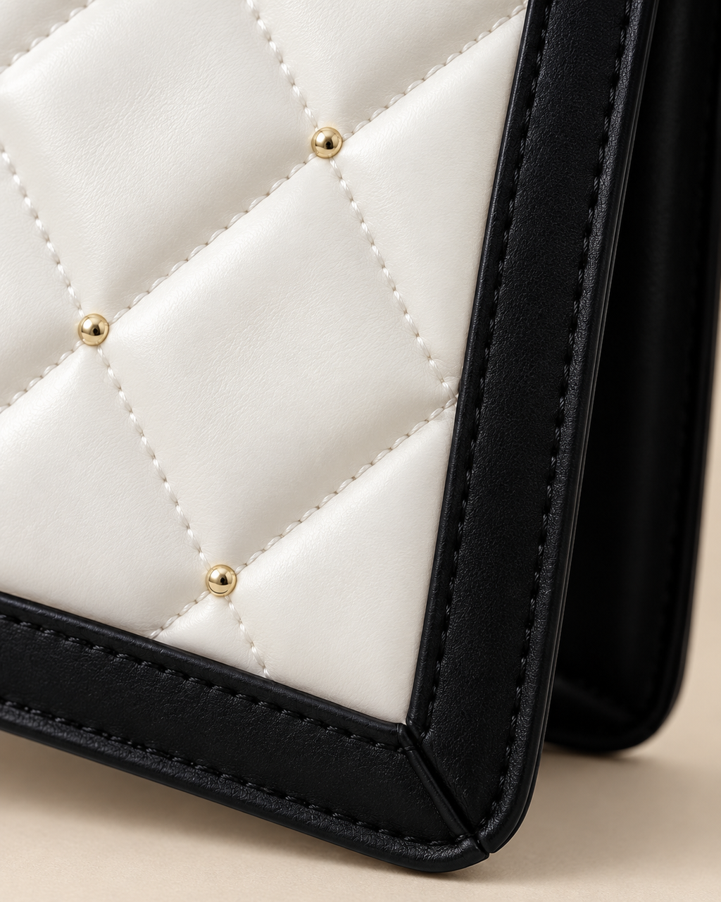 Black edge piping and stitching detail