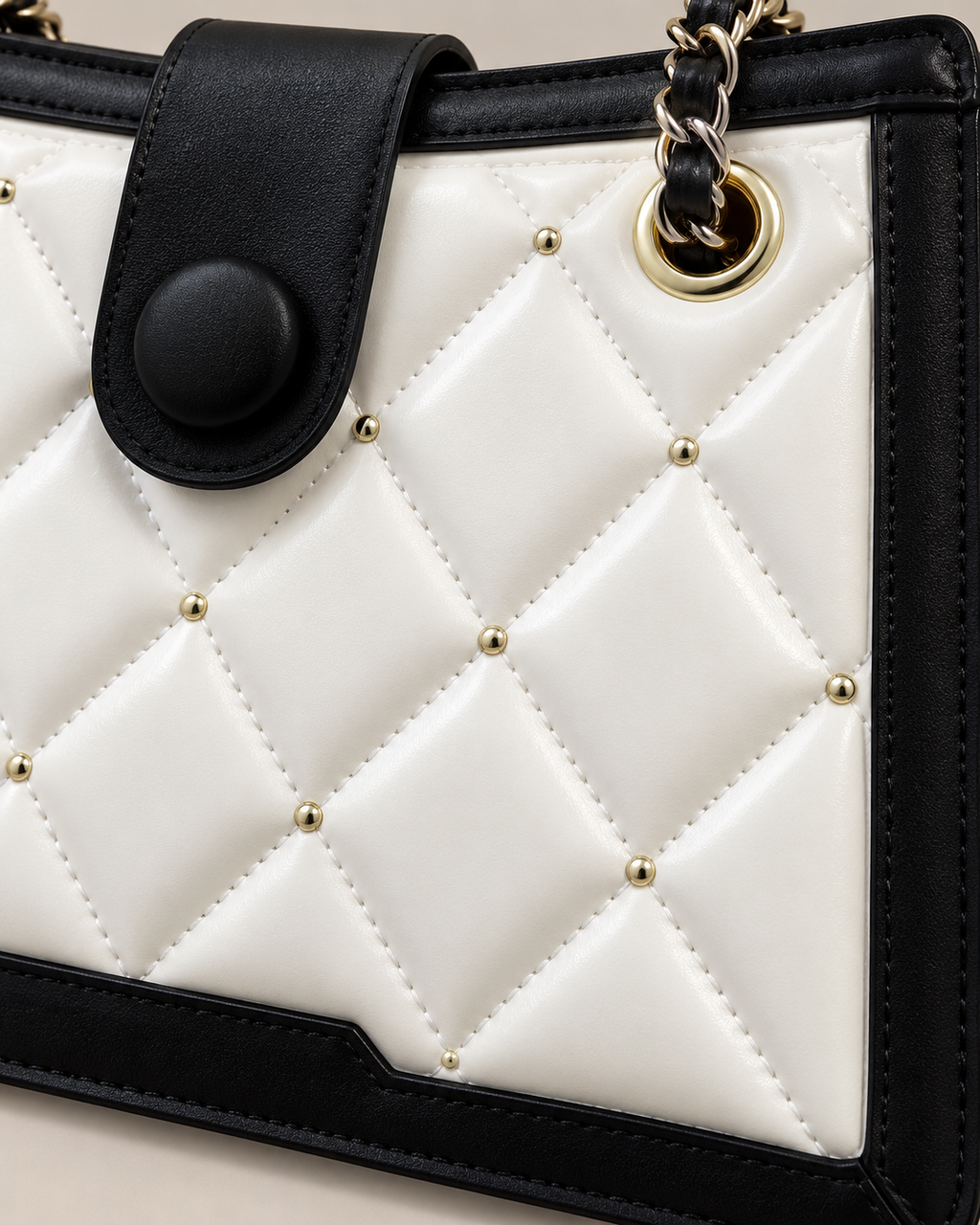 Diamond quilting and gold stud detail