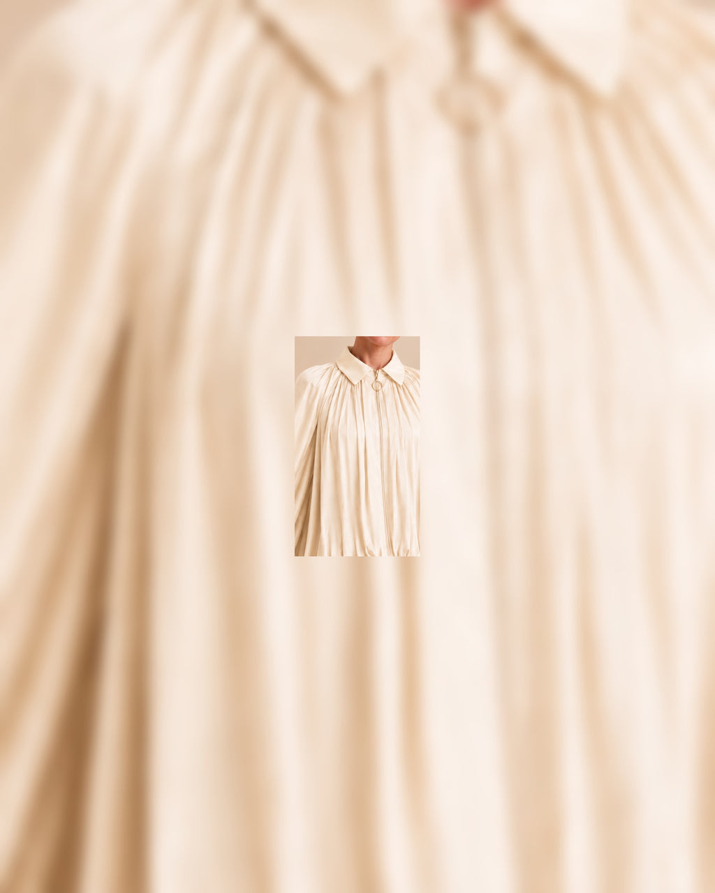 Gold ring zipper detail