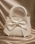 Ivory Bow Top Handle Bag