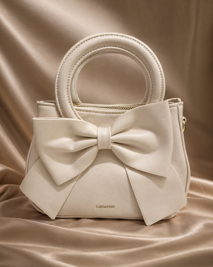 Ivory Bow Top Handle Bag