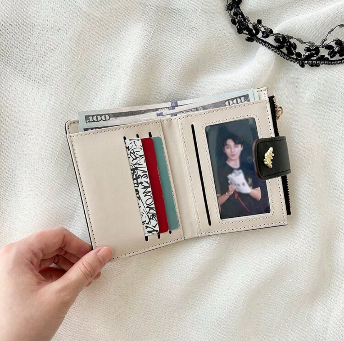 Ivory floral compact wallet interior with card slots and ID window