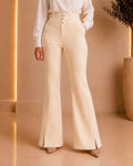 Ivory high-waisted flare trousers front view