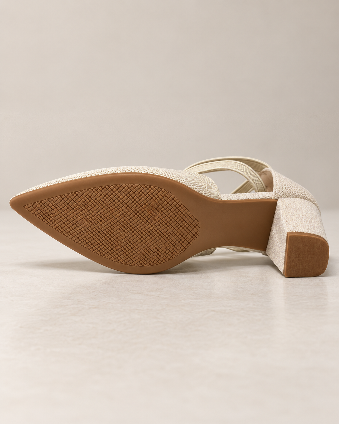 Outsole tread and heel cap detail