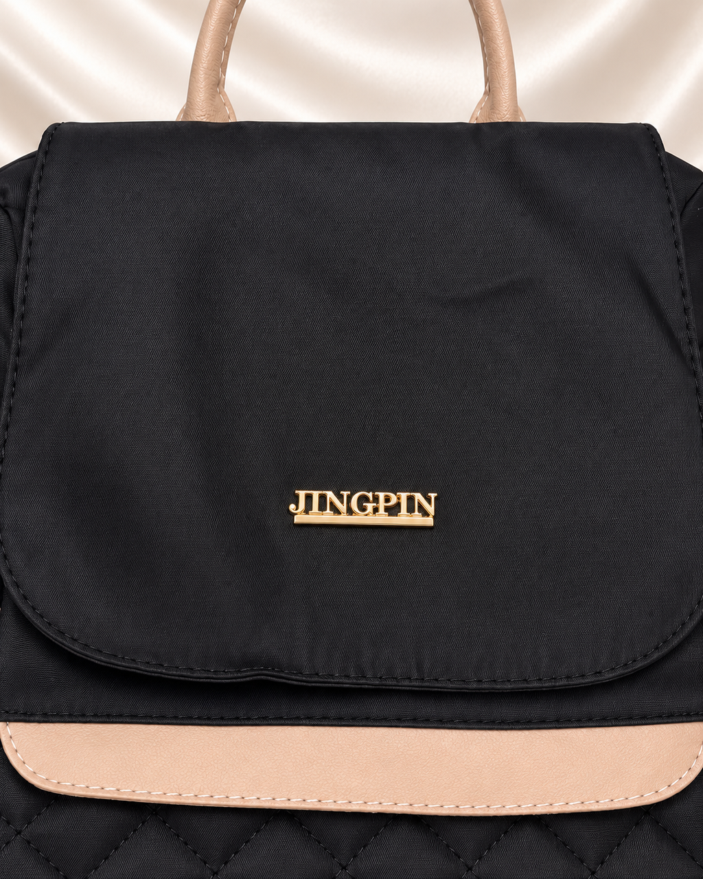 JINGPIN backpack front flap logo and trim detail