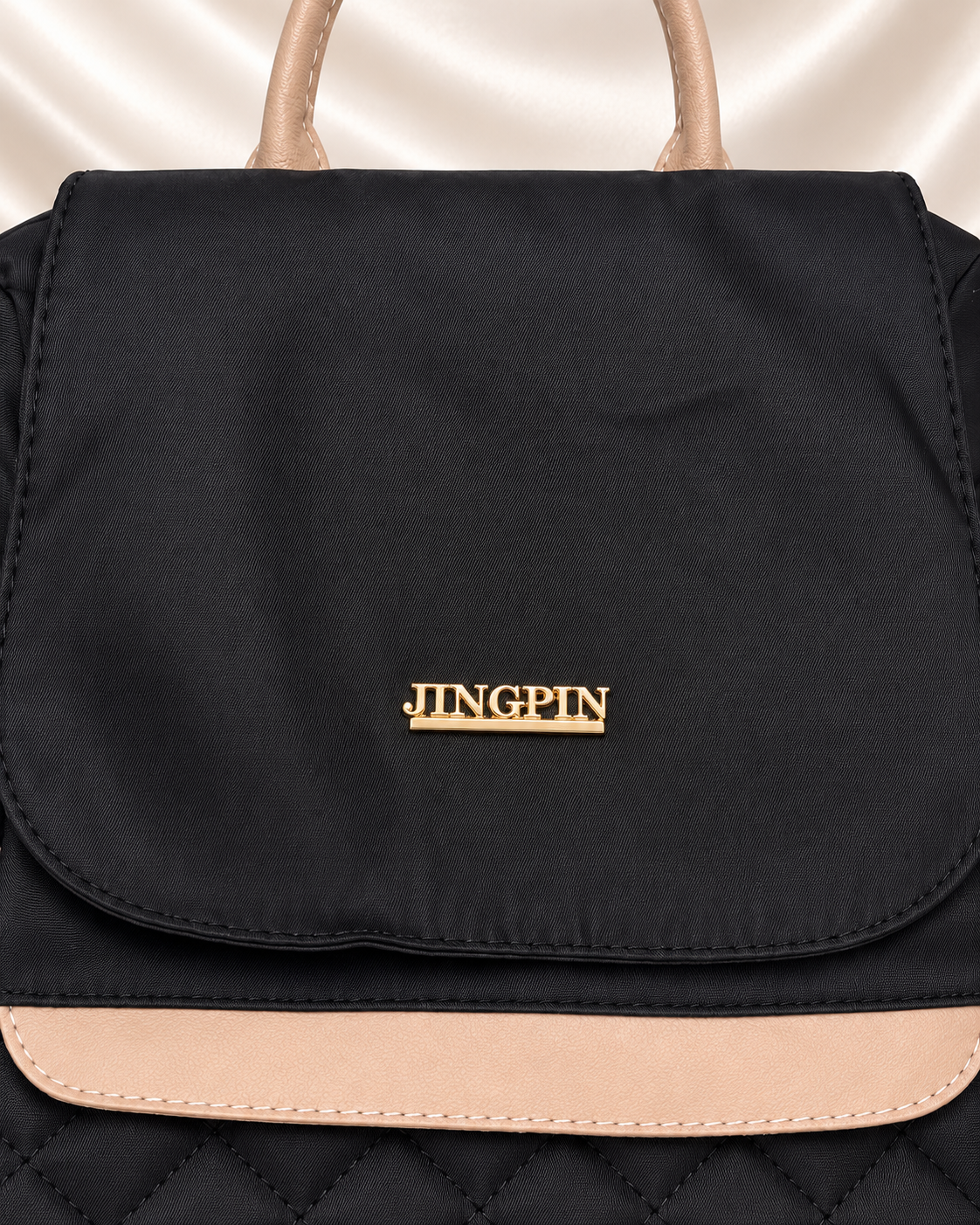JINGPIN backpack front flap logo and trim detail