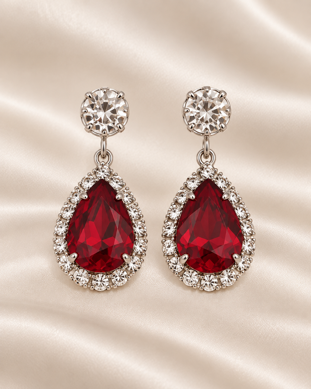 Matching red crystal earrings detail