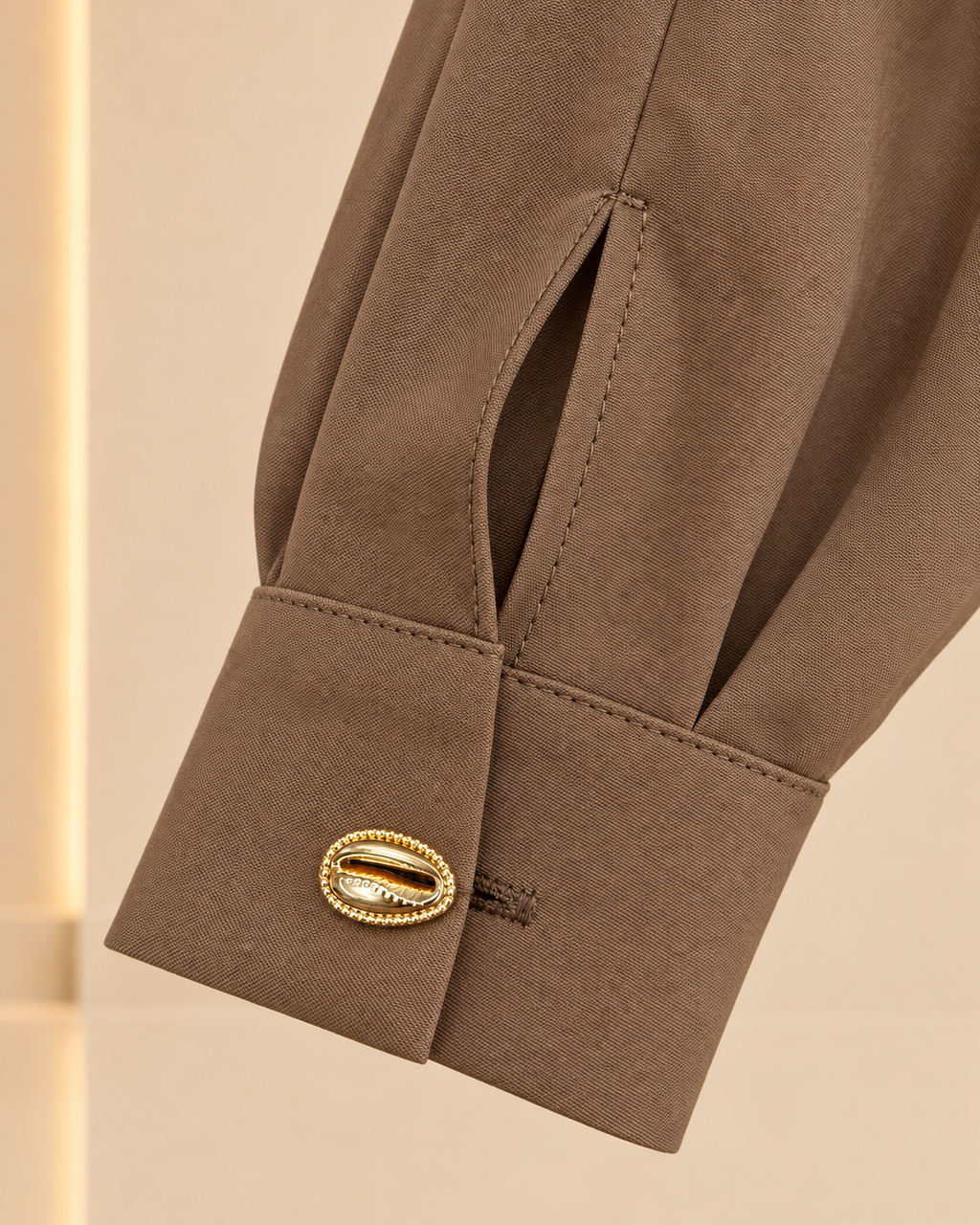 Cuff and gold button detail