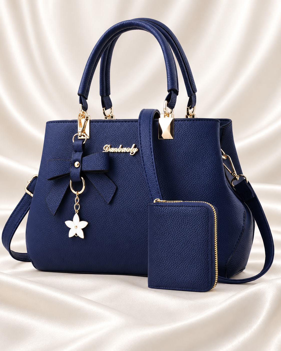 Navy bow charm handbag with matching wallet