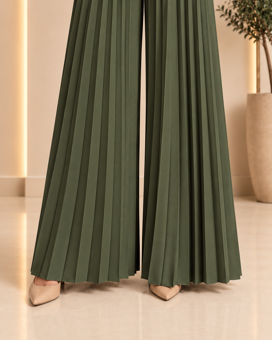 Olive green jumpsuit pleated hem and trouser leg detail