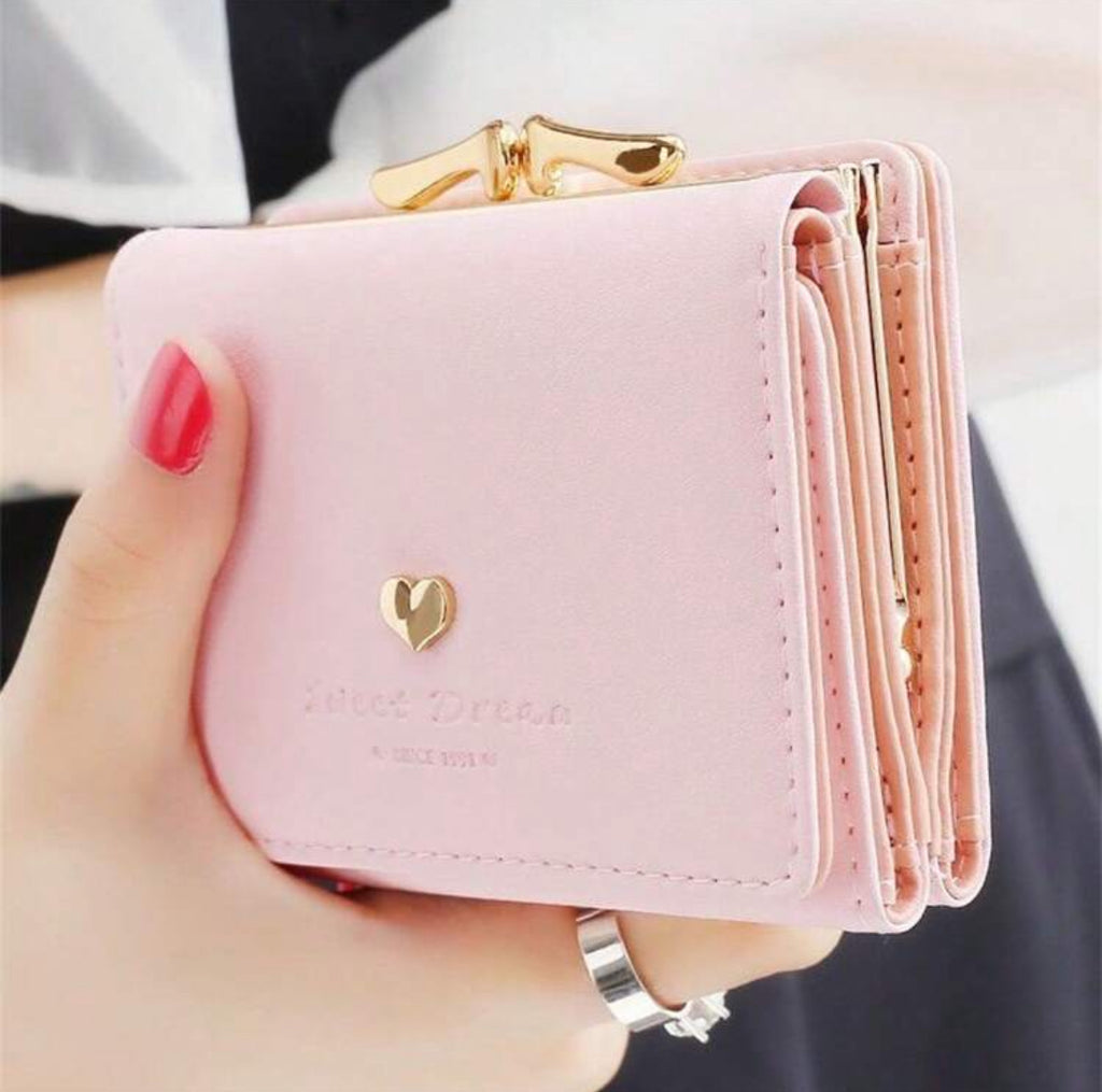 Pink Sweet Dream compact wallet in hand