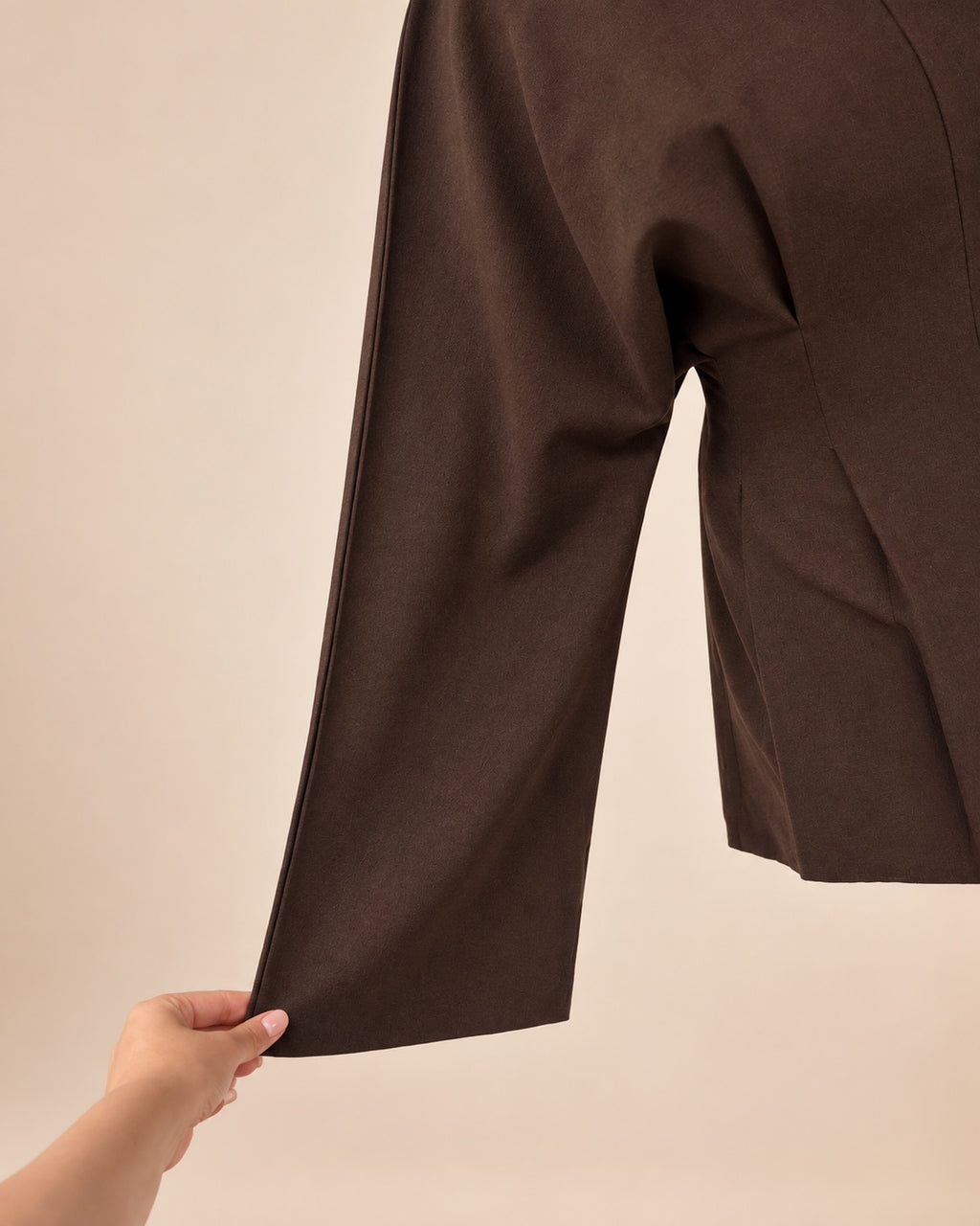 Chocolate brown sleeve and fabric detail