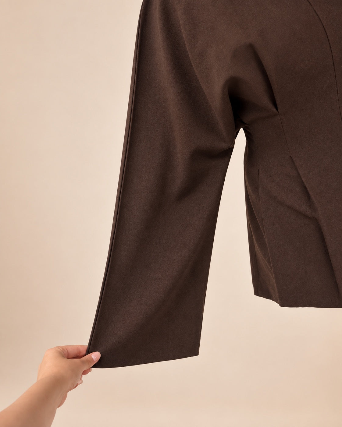 Chocolate brown sleeve and fabric detail