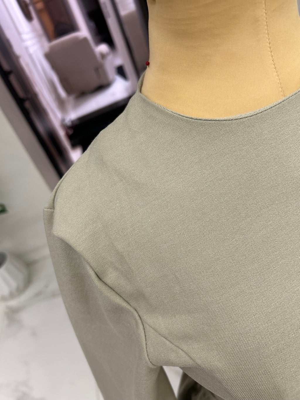 Original sage green fabric and neckline detail
