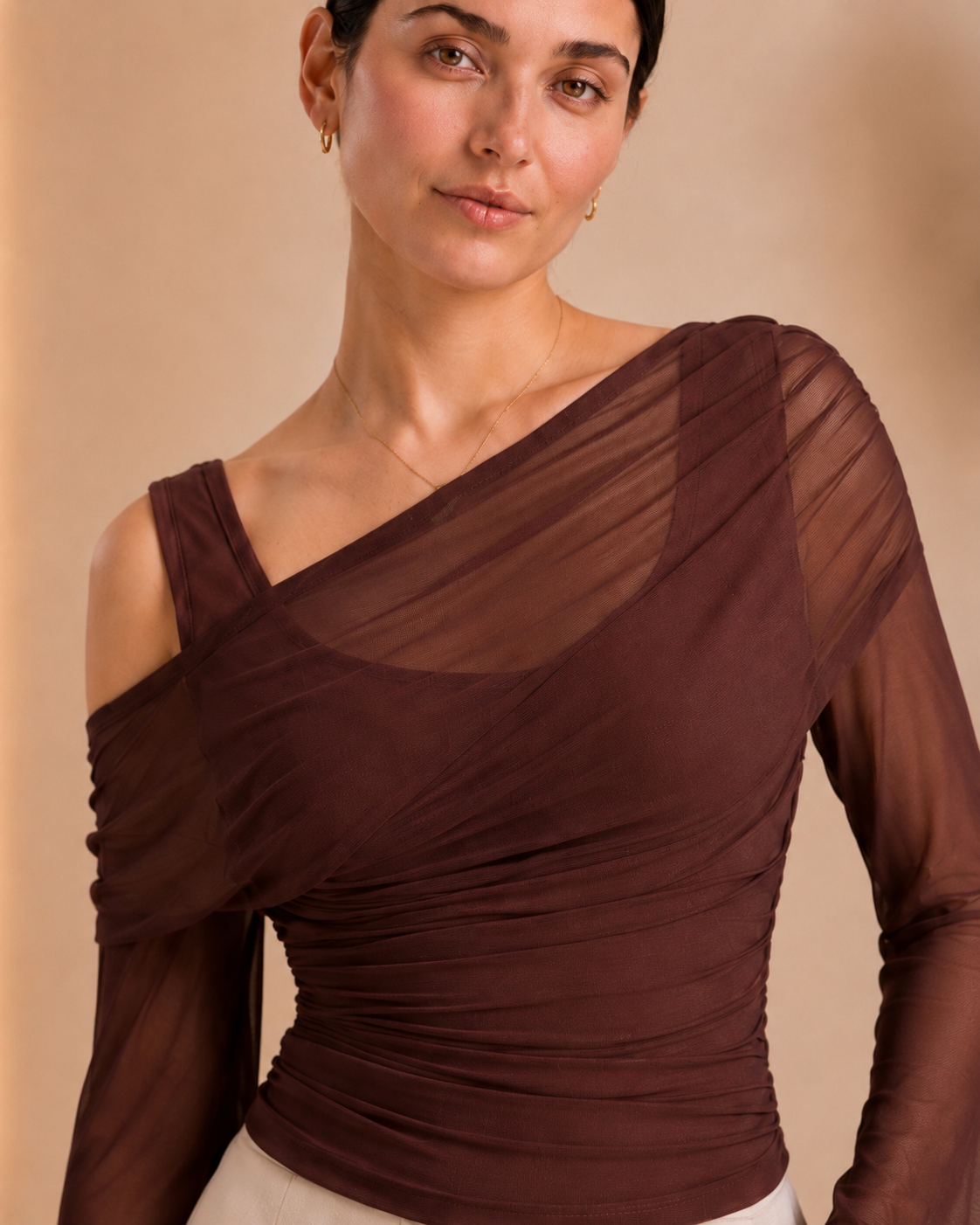 Asymmetric neckline and shoulder detail
