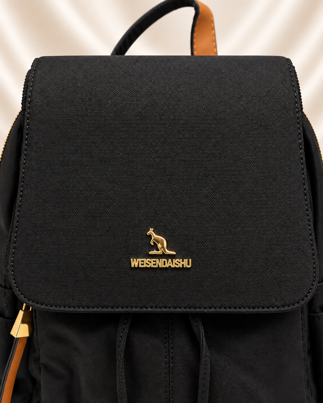 Black backpack flap and logo detail