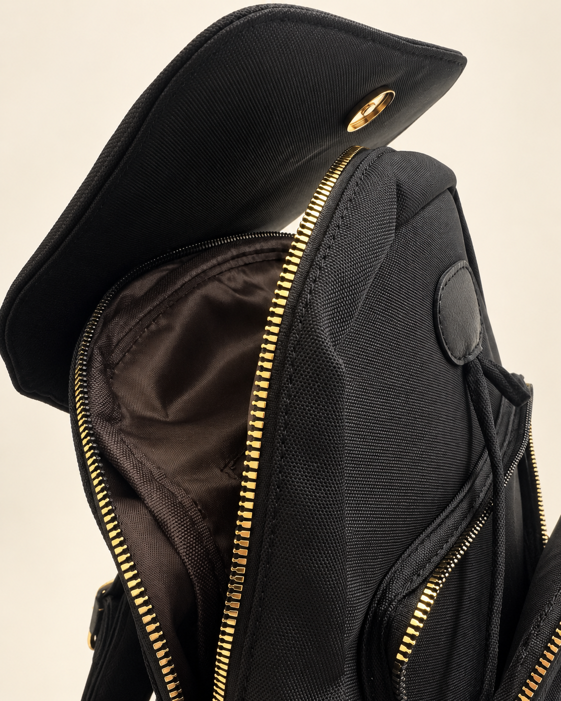Black backpack open zipper and compartment detail