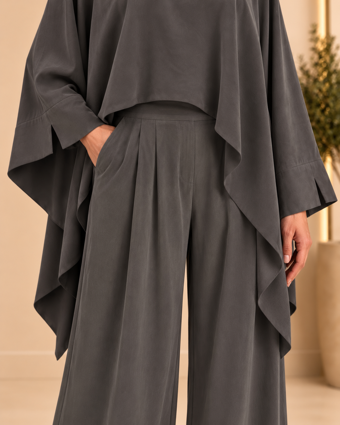 Trouser waistband and pleat detail