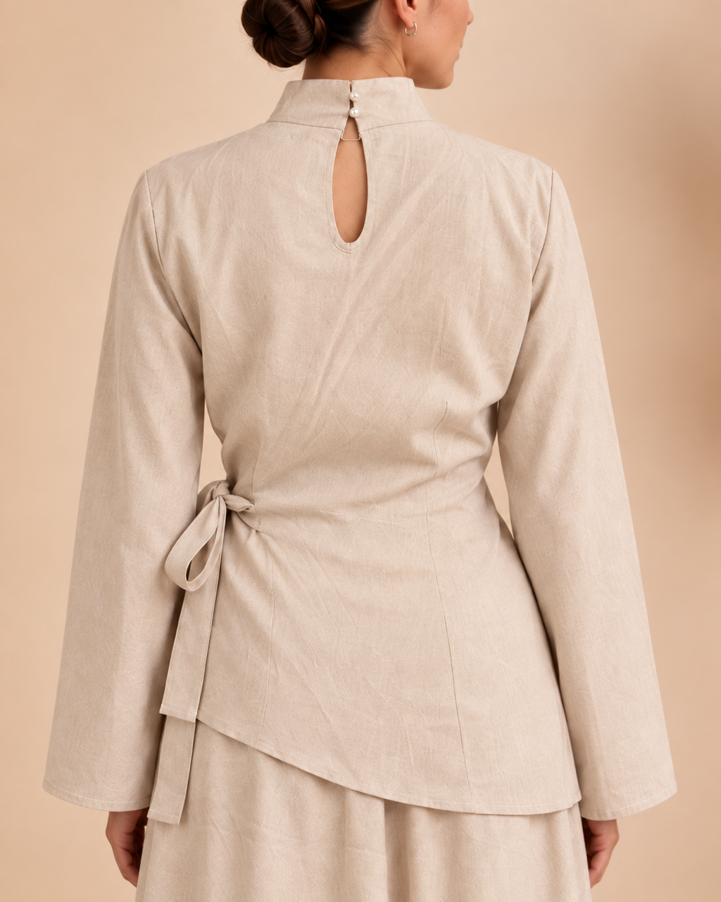 Ivory back top seams and tie detail