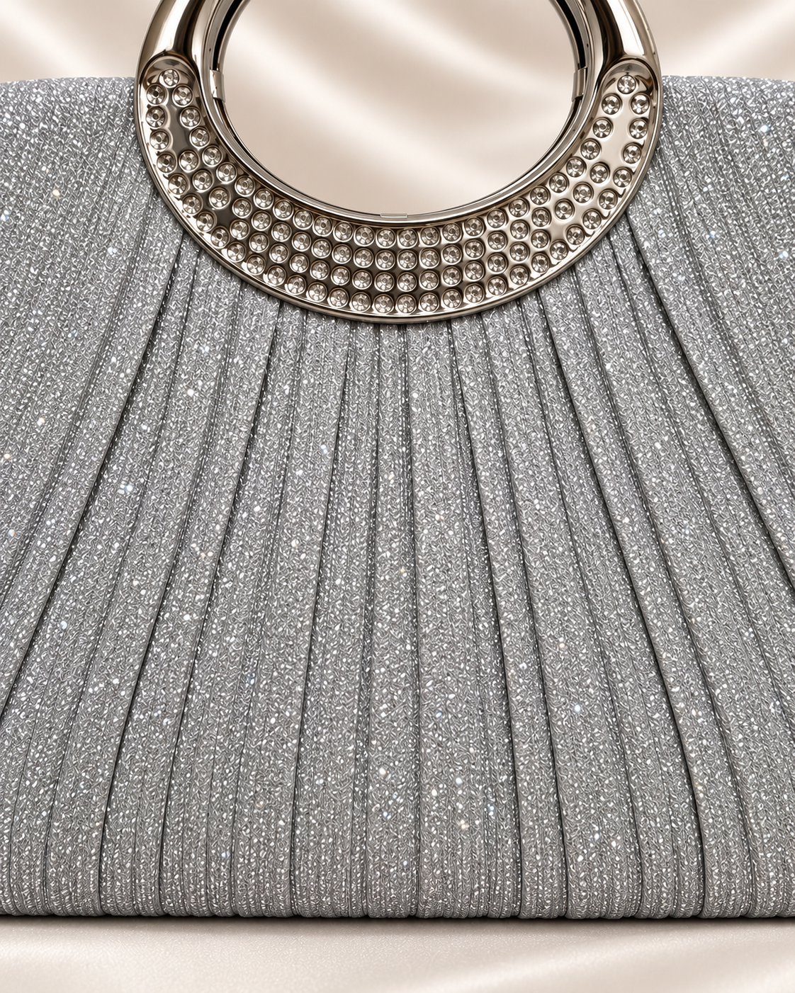 Front detail of silver glitter pleated evening bag