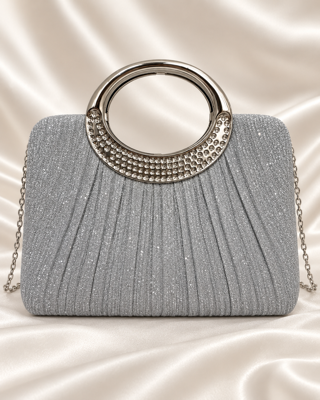 Silver glitter evening bag with rhinestone circular handle