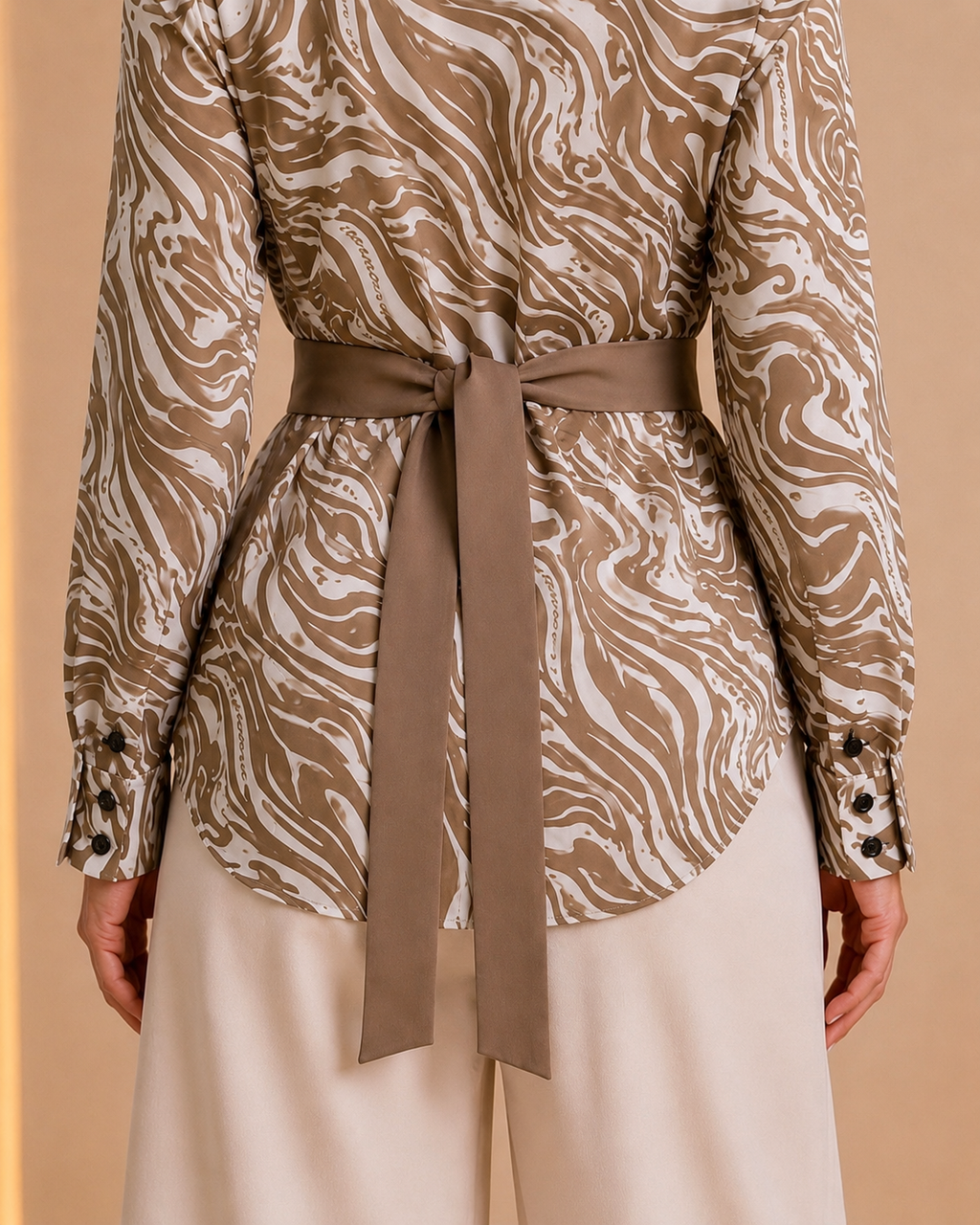 Back waist belt and hem detail
